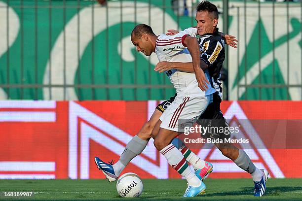 Carlinhos of Fluminense fights for the ball with Lucas of Botafogo during a match between Fluminense and Botafogo as part of Rio State Championship...