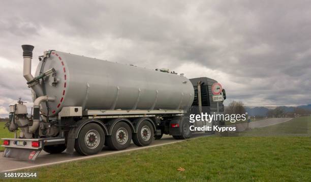 cargo lorry delivering goods - oil container stock pictures, royalty-free photos & images