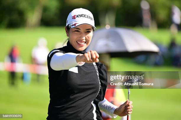 Ritsuko Ryu of Japan acknowledges the gallery after holing out on the 18th green during the first round of 54th SUMITOMO LIFE Vitality Ladies Tokai...