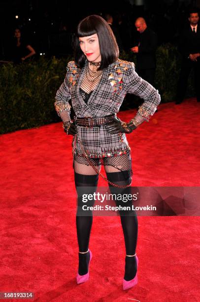 Madonna attends the Costume Institute Gala for the "PUNK: Chaos to Couture" exhibition at the Metropolitan Museum of Art on May 6, 2013 in New York...