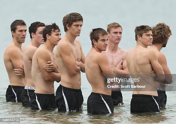 The Magpies wade in the water during a Collingwood Magpies AFL recovery session at St Kilda Sea Baths on May 7, 2013 in Melbourne, Australia.