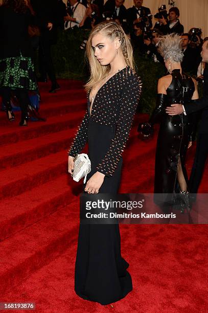 Cara Delevingne attends the Costume Institute Gala for the "PUNK: Chaos to Couture" exhibition at the Metropolitan Museum of Art on May 6, 2013 in...