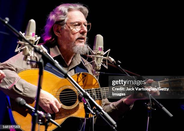 American country and folk musician Norman Blake performs on stage as part of the Great High Mountain Tour at the Beacon Theater, New York, New York,...