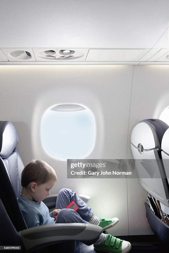 Young boy on aeroplane