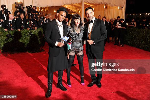 Brahim Zaibat, Madonna and designer Riccardo Tisci attend the Costume Institute Gala for the "PUNK: Chaos to Couture" exhibition at the Metropolitan...