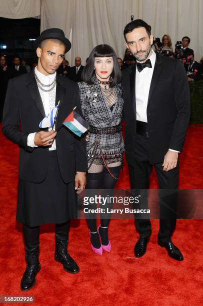 Brahim Zaibat, Madonna and designer Riccardo Tisci attend the Costume Institute Gala for the "PUNK: Chaos to Couture" exhibition at the Metropolitan...