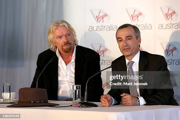 Sir Richard Branson and Virgin CEO John Borghetti speak at a press conference at Perth Airport on May 7, 2013 in Perth, Australia. Virgin Australia...