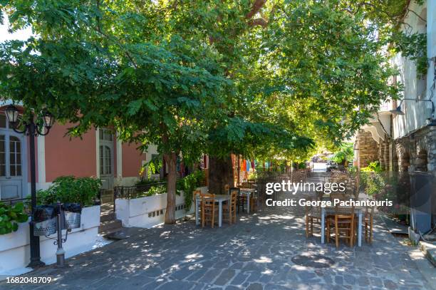 cafes and restaurants on raches village, ikaria, greece - north aegean greece stock pictures, royalty-free photos & images