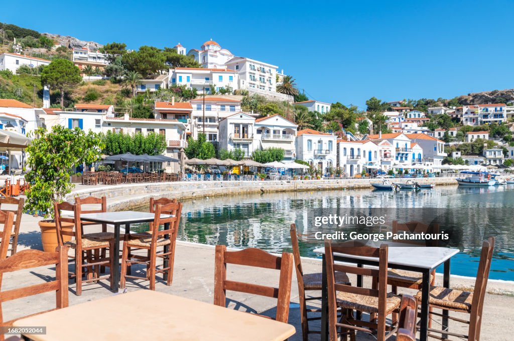 Restaurant tables next to the sea on Ikaria island, Greece