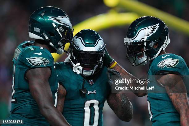 Brown, D'Andre Swift, and DeVonta Smith of the Philadelphia Eagles celebrate against the Minnesota Vikings at Lincoln Financial Field on September...