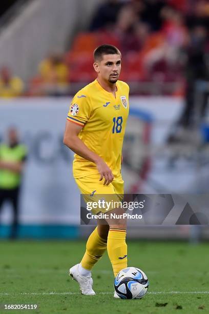 Razvan Marin of Romania in action during the UEFA EURO 2024 European qualifier match between Romania and Kosovo at National Arena in Bucharest,...