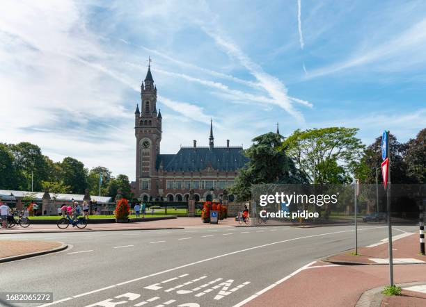 steetview of the peace palace in the hague, netherlands. - international court of justice stock pictures, royalty-free photos & images