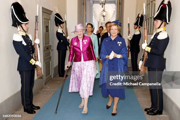 Queen Margrethe II of Denmark and Queen Anne-Marie of Greece arrive for the Te Deum during the celebration of the 50th coronation anniversary of King...