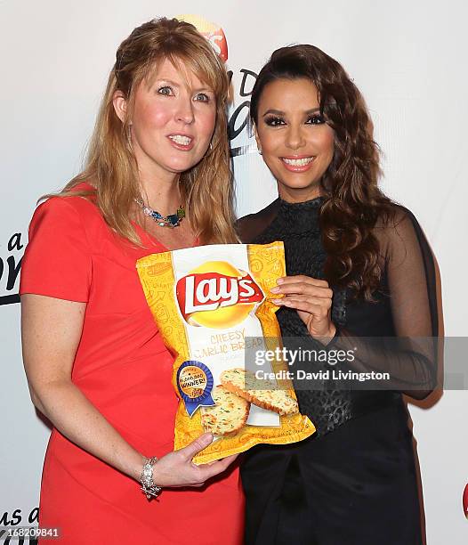 Contest winner Karen Weber-Mendham and actress Eva Longoria attend Lay's "Do Us a Flavor" contest hosted by Eva Longoria at Beso on May 6, 2013 in...