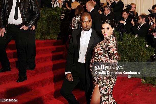 Kanye West and Kim Kardashian attend the Costume Institute Gala for the "PUNK: Chaos to Couture" exhibition at the Metropolitan Museum of Art on May...