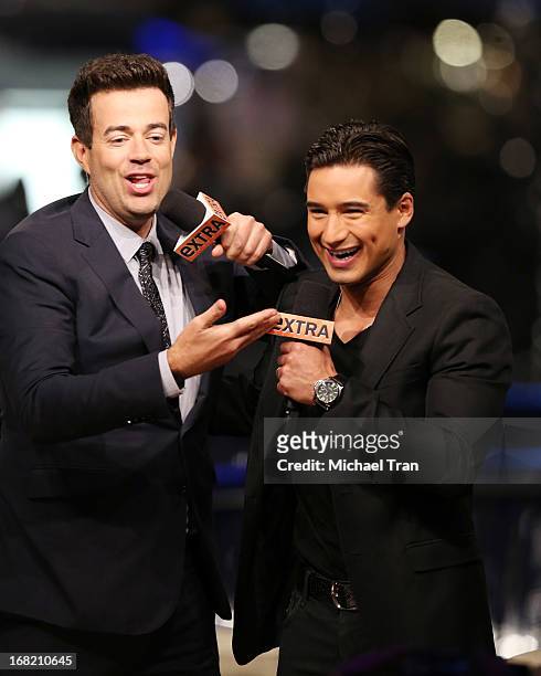 Carson Daly and Mario Lopez attend the celebrity judges from "The Voice" appear On "Extra" at The Grove on May 6, 2013 in Los Angeles, California.