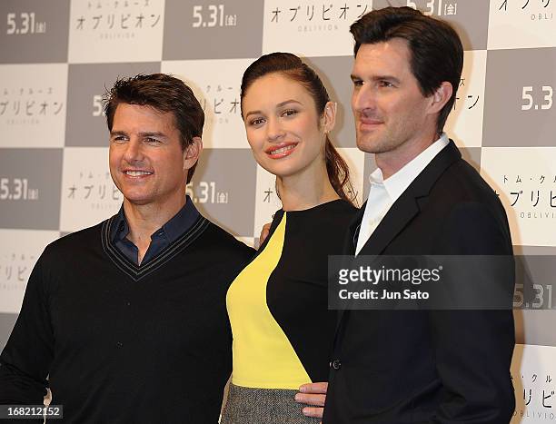 Tom Cruise, Olga Kurylenko and director Joseph Kosinski attend the 'Oblivion' press conference at Ritz Carlton Tokyo on May 7, 2013 in Tokyo, Japan....