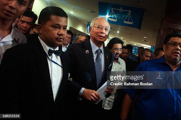 Malaysia's Prime Minister, Najib Razak arrives for the first meeting with his newly elected Barisan Nasional's parlimentary and state representative...