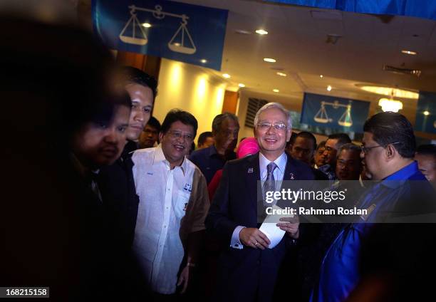 Malaysia's Prime Minister, Najib Razak arrives for the first meeting with his newly elected Barisan Nasional's parlimentary and state representative...