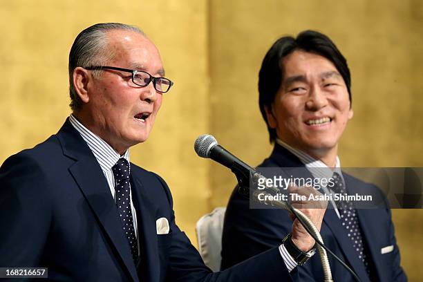 Former professional baseball player Shigeo Nagashima speaks while Hideki Matsui listens during a press conference on their People's Honor Award on...