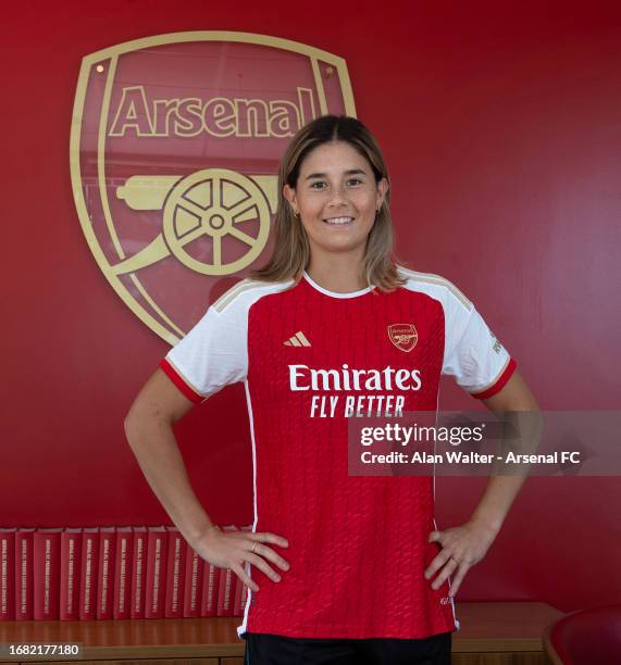 Kyra Cooney-Cross signs for Arsenal Women at the Arsenal Training Ground at London Colney on September 14, 2023 in St Albans, England.