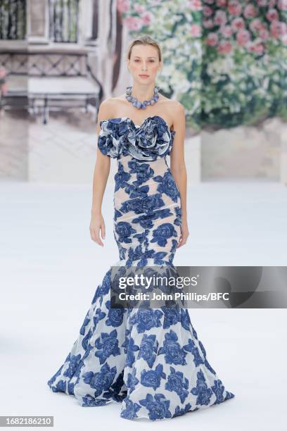 Model walks the runway at the Paul Costelloe show during London Fashion Week September 2023 at the Royal Horticultural Halls on September 15, 2023 in...