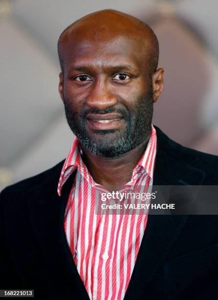 France's Souleymane M'Baye poses on May 7, 2013 before a press conference at the Casino of Monte-Carlo in the principality of Monaco. M'Baye is to...