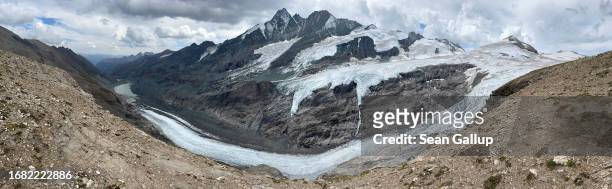 In this panorama photo taken with an iPhone 13, the tongue of the Pasterze glacier descends from the glacier plateau on September 12, 2023 near...
