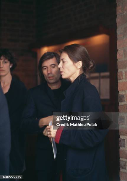 Actrice britannique Jane Birkin avec le réalisateur français Jacques Doillon lors des obsèques de son père David Birkin, le 14 mars 1991 à Londres.