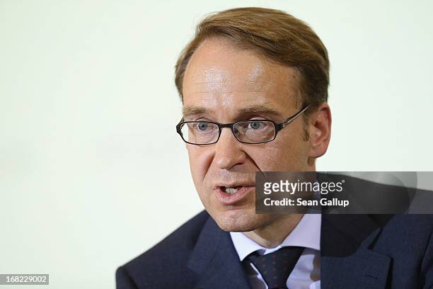 Bundesbank head Jens Weidmann speaks to the media following events marking the 25th anniversary of the Franco-German Finance and Econimic Council on...