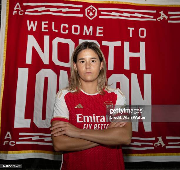 Kyra Cooney-Cross signs for Arsenal Women at the Arsenal Training Ground at London Colney on September 14, 2023 in St Albans, England.