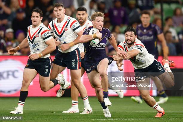 Harry Grant of the Storm is tackled during the NRL Semi Final match between Melbourne Storm and the Sydney Roosters at AAMI Park on September 15,...