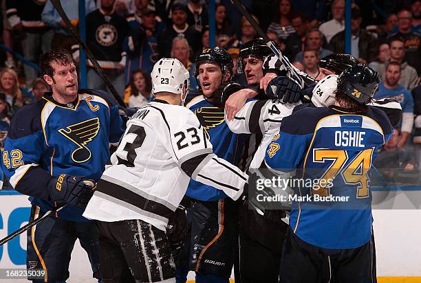 Alex Pietrangelo of the St. Louis Blues exchanges words with Dustin Brown of the Los Angeles Kings in Game Two of the Western Conference...