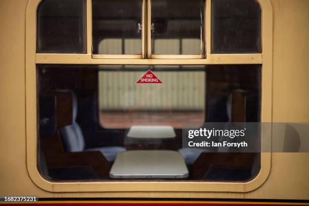 Railway carriage waits for passengers at the North Yorkshire Moors Railway station at Pickering on September 15, 2023 in Pickering, England. The...