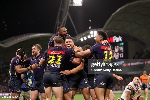 Will Warbrick of the Storm celebrates scoring a try with team mates during the NRL Semi Final match between Melbourne Storm and the Sydney Roosters...