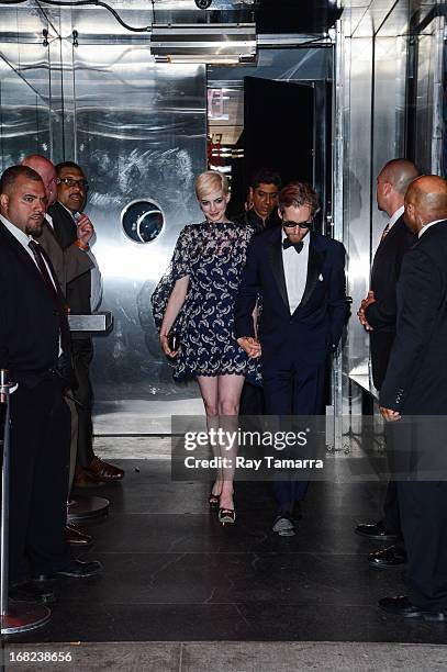 Actress Anne Hathaway and Adam Shulman leave the "PUNK: Chaos To Couture" Costume Institute Gala after party at the Standard Hotel on May 6, 2013 in...