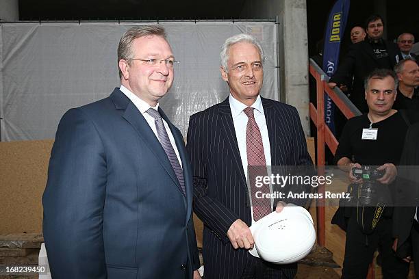 Frank Henkel and Peter Ramsauer attend roofing ceremony at BMW new Berlin location at BMW Niederlassung Berlin on May 7, 2013 in Berlin, Germany.