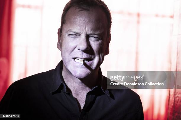 Actor Kiefer Sutherland poses for a portrait session on March 20, 2012 in Los Angeles, California.