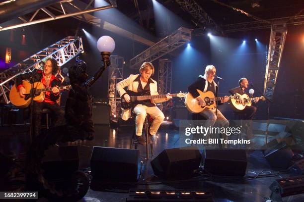 July 10: Vivian Campbell, Rick Savage, Joe Elliott and and Phil Collen of the rock group Def Leppard performs on July 10th, 1999 in Las Vegas.