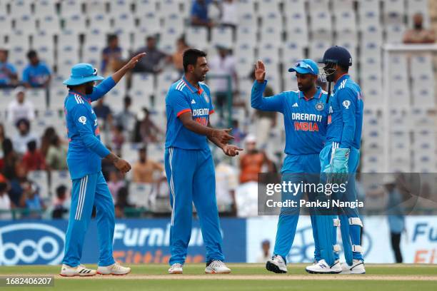 Ravichandran Ashwin of India celebrates the wicket of Marnus Labuschagne of Australia during game one of the One Day International series between...