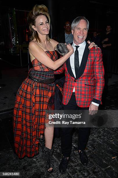 Fashion designer Tommy Hilfiger and Dee Ocleppo Hilfiger leave the "PUNK: Chaos To Couture" Costume Institute Gala after party at the Standard Hotel...