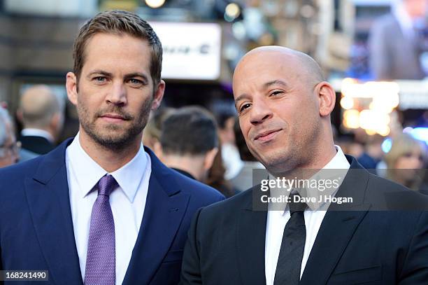 Paul Walker and Vin Diesel attend the world premiere of 'Fast And Furious 6' at The Empire Leicester Square on May 7, 2013 in London, England.