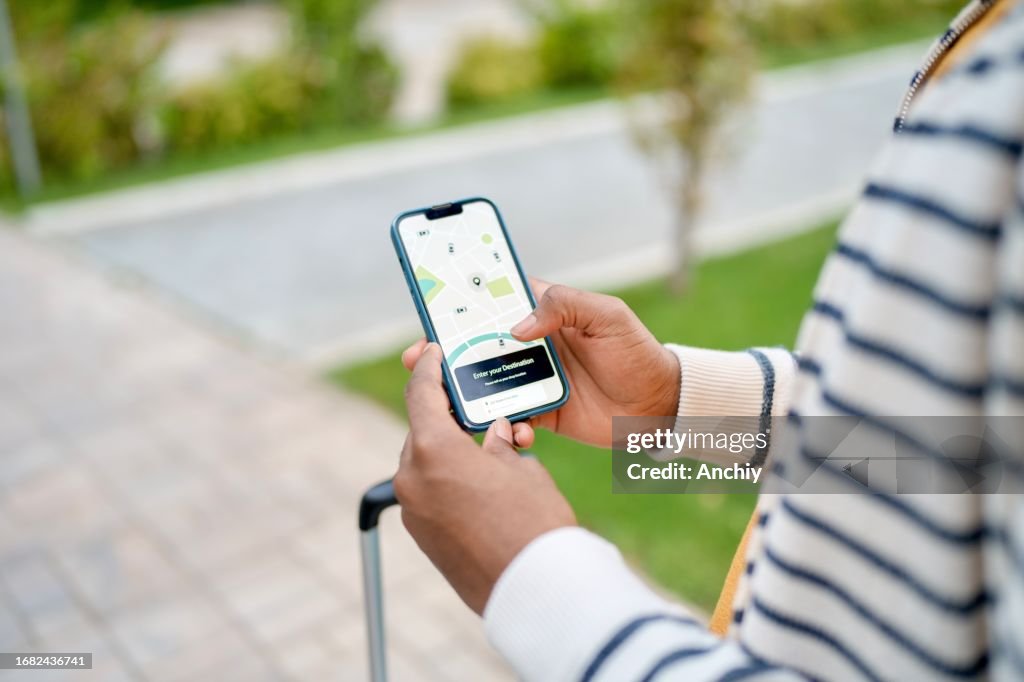Close-up of a man using car app