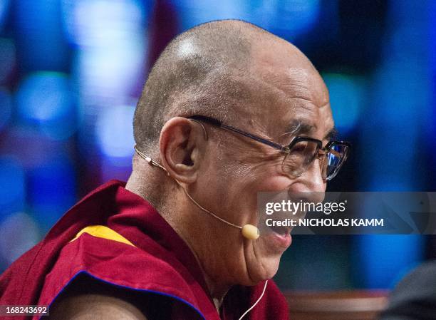 Tibetan spiritual leader the Dalai Lama looks on before delivering the Sadat Lecture for Peace, entitled "Peace Through Compassion: Connecting a...