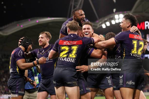 Will Warbrick of the Storm celebrates scoring a try with team mates during the NRL Semi Final match between Melbourne Storm and the Sydney Roosters...