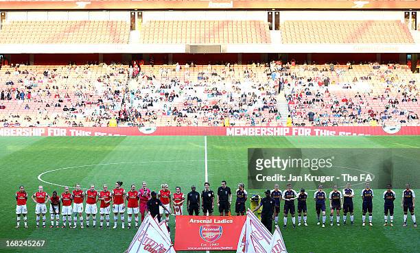 The teams line up ahead of the FA WSL Continental Cup match between Arsenal Ladies FC and Liverpool Ladies FC at Emirates Stadium on May 7, 2013 in...