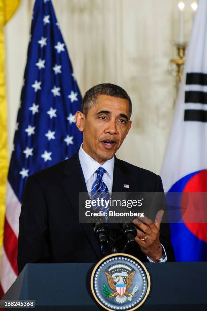 President Barack Obama speaks during a press conference with Park Geun Hye, president of South Korea, unseen, in the East Room of the White House in...