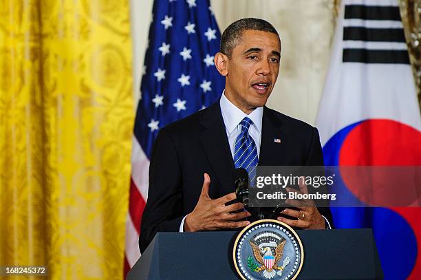 President Barack Obama speaks during a press conference with Park Geun Hye, president of South Korea, unseen, in the East Room of the White House in...