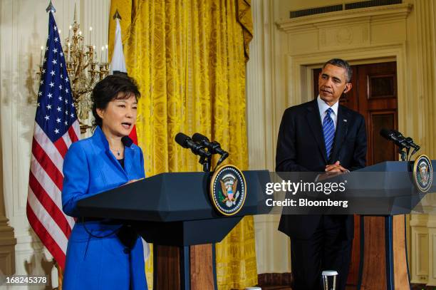 President Barack Obama, right, listens as Park Geun Hye, president of South Korea, speaks during a press conference in the East Room of the White...