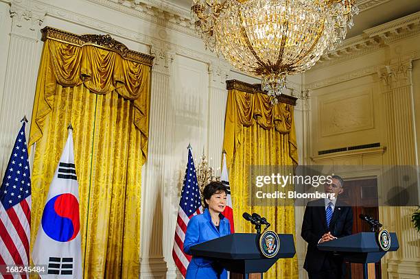 President Barack Obama, right, listens as Park Geun Hye, president of South Korea, speaks during a press conference in the East Room of the White...